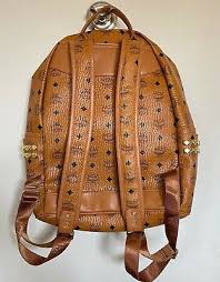 MCM Medium STARK bedruckter Rucksack braun Cognac Canvas Leder Unisex gebraucht